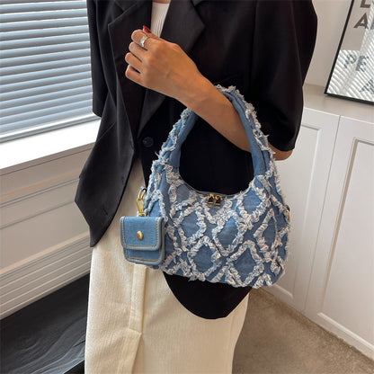 Ruby – Gesteppte Denim-Handtasche