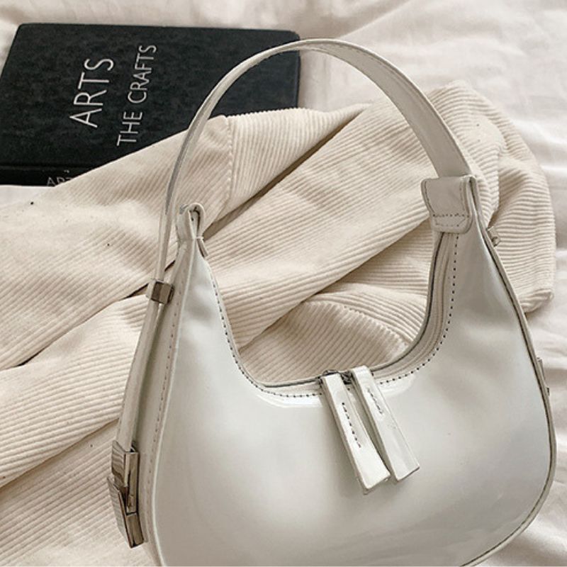 Sacs à bandoulière en cuir verni Scilla