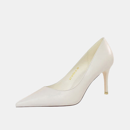 Einfarbige Gänseblümchen-Pumps