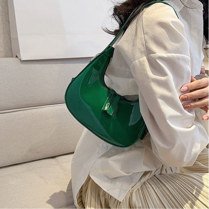 Sacs à bandoulière en cuir verni Scilla