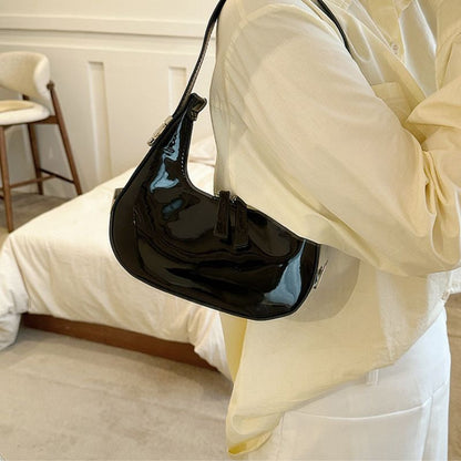 Sacs à bandoulière en cuir verni Scilla