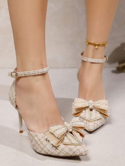 Lunaria Pumps mit Strass-Schleife