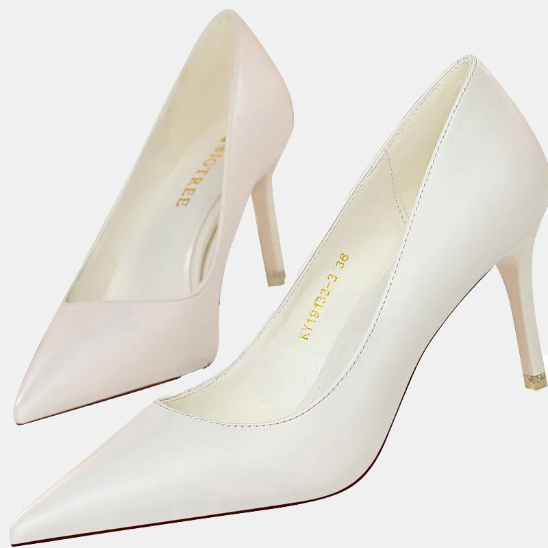 Einfarbige Gänseblümchen-Pumps