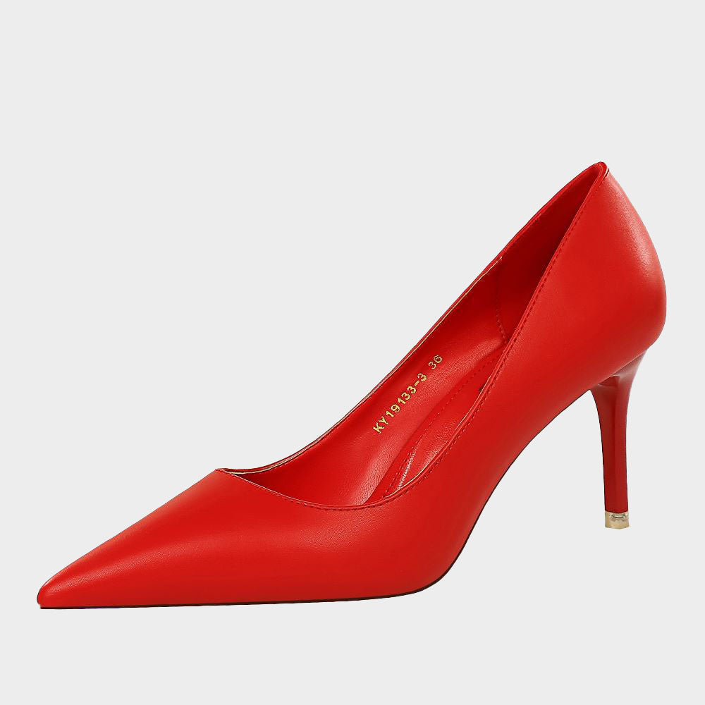 Einfarbige Gänseblümchen-Pumps