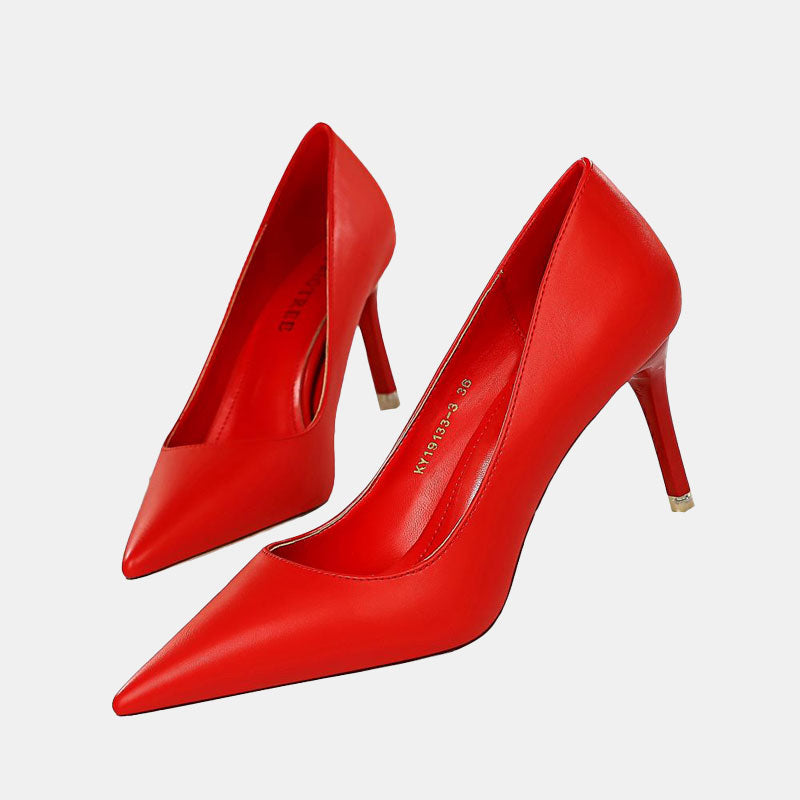 Einfarbige Gänseblümchen-Pumps