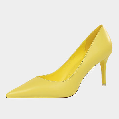 Einfarbige Gänseblümchen-Pumps