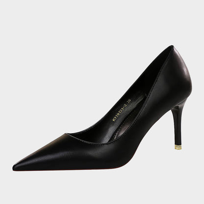 Einfarbige Gänseblümchen-Pumps